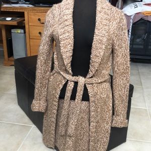 Warm long knitted sweater